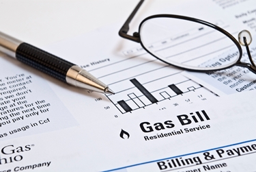 bolletta del gas più occhiali e penna